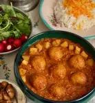 تصویر کوفته مرغ با سس بادمجان کبابی